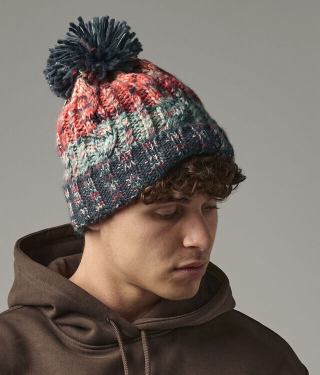 Corkscrew pom pom beanie